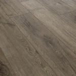 A close up view of Audacity Ripple Oak Vinyl Plank Flooring