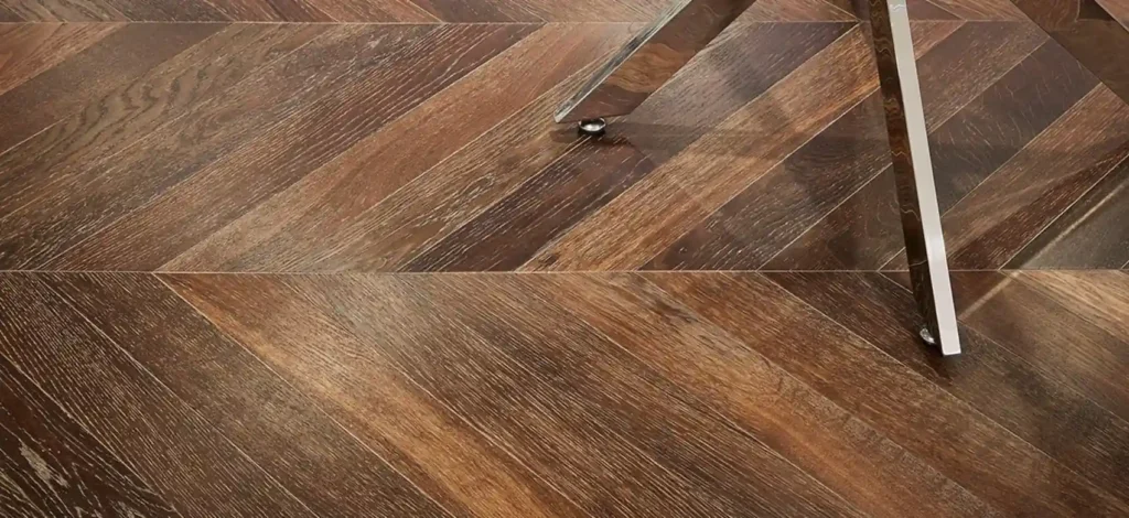 Close-up of Notte Chevron wood flooring