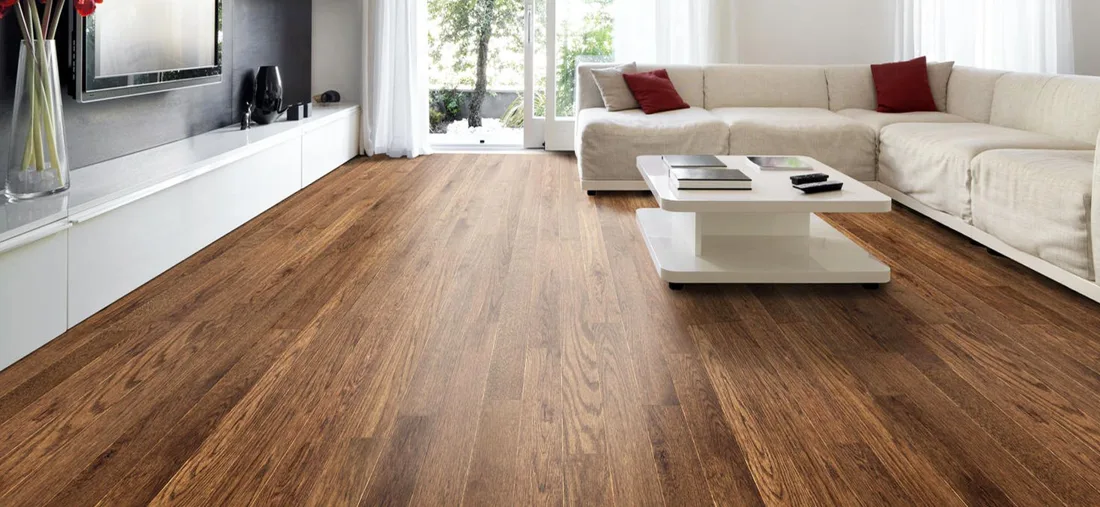 Wide plank laminate flooring in open-plan space