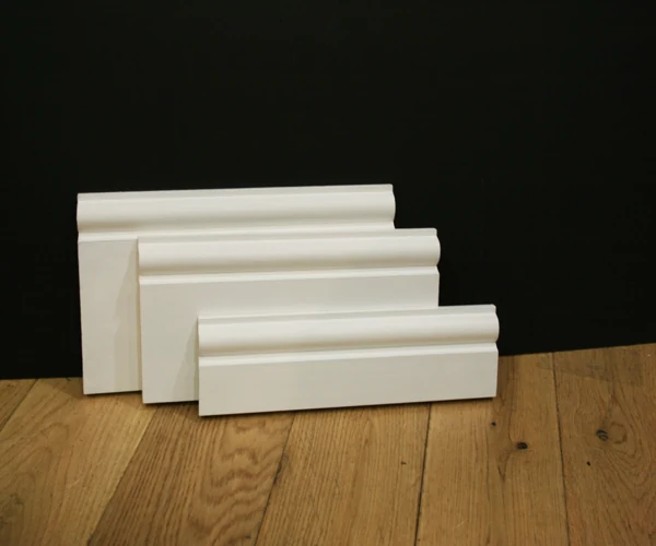 White skirting board samples on floor